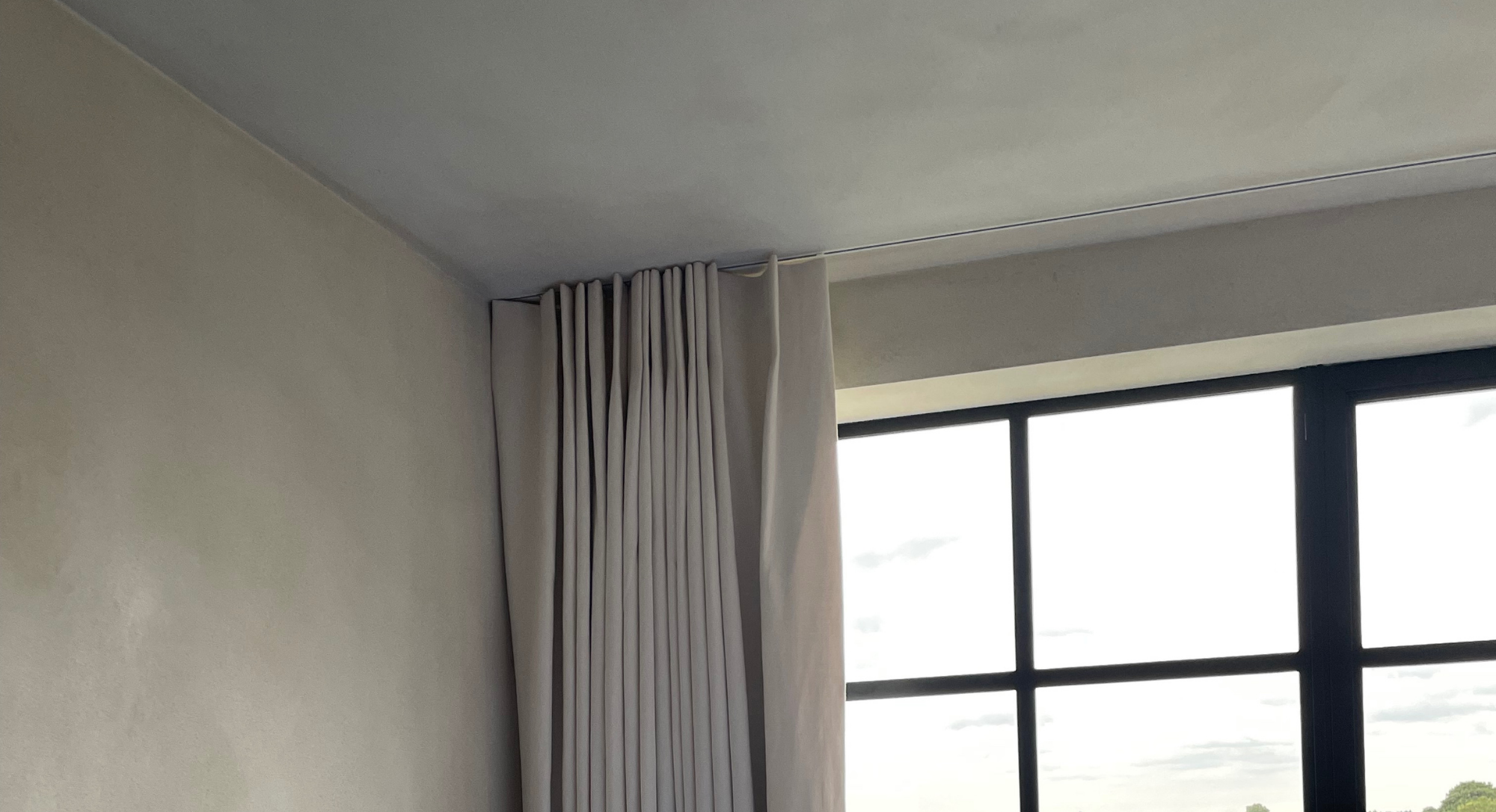 ceiling track with cotton-linen curtains